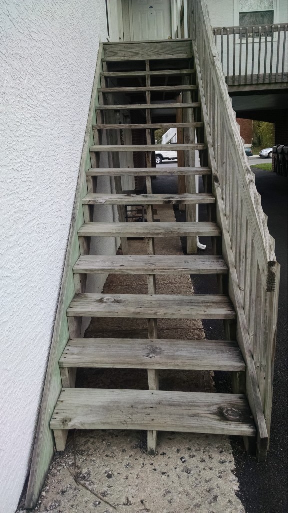 The old steps were uneven. The wood was beginning to rot and the nails were coming out.